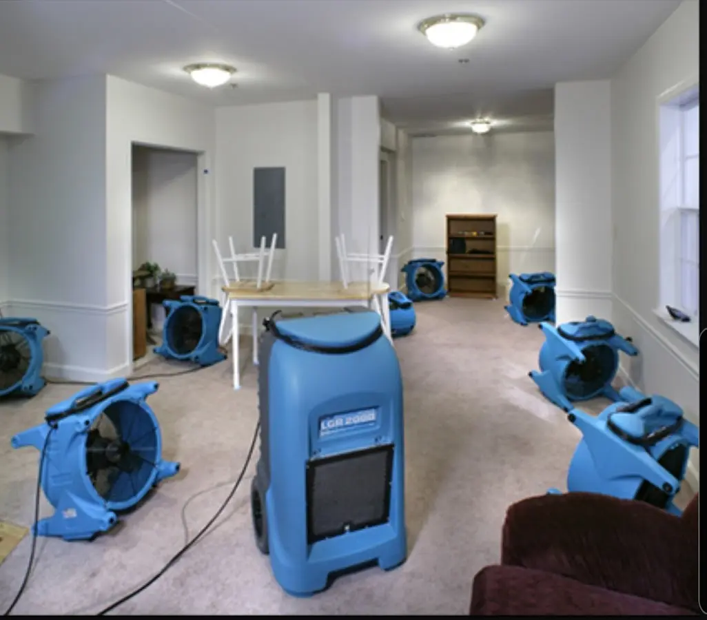 Air movers and dehumidifier setup for Water Damage Restoration in Americus